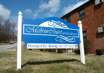 Melvin Court Aparments Sign board