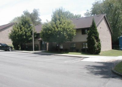 Image of the two story Cedarwood Apartments